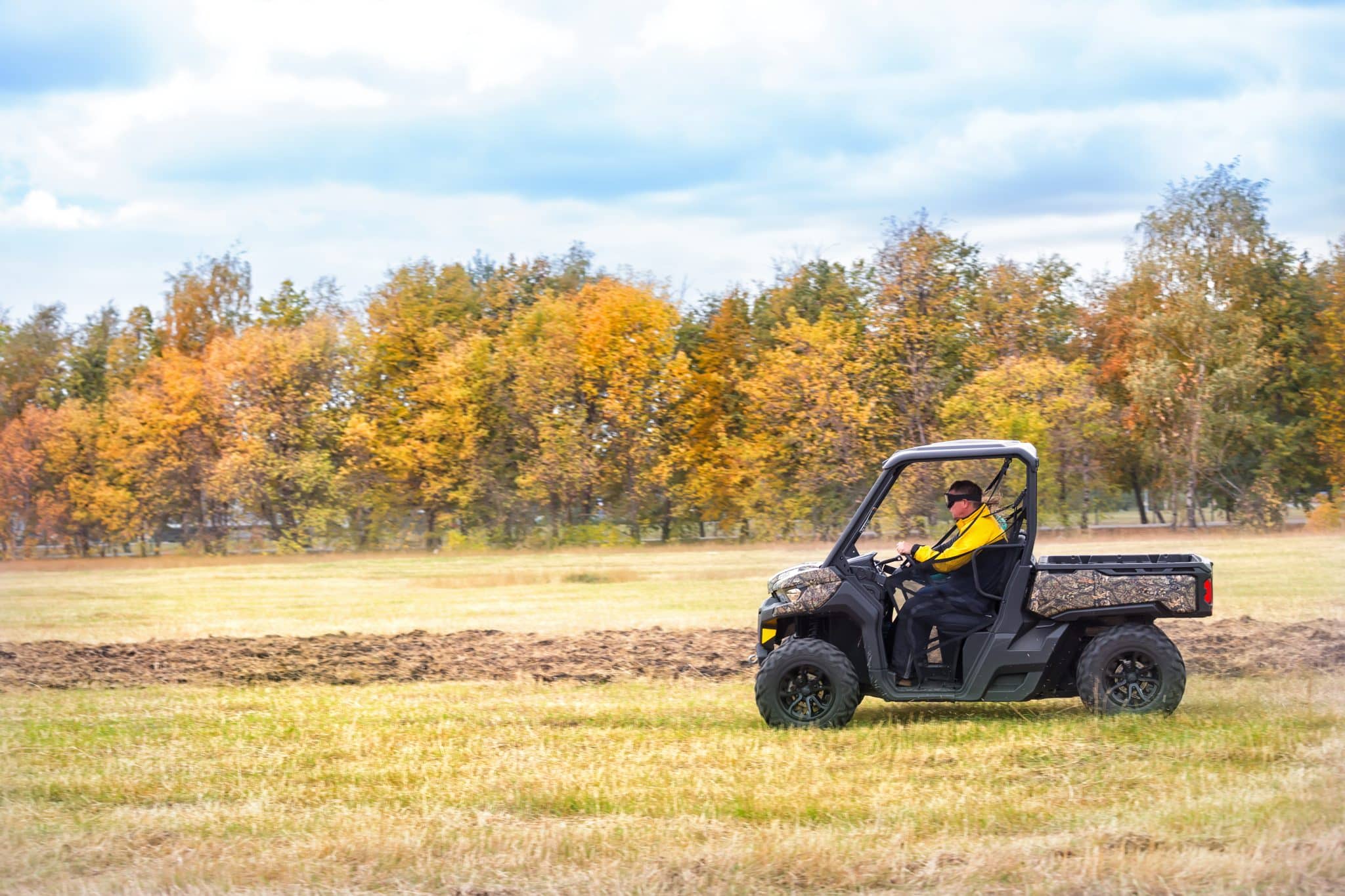 driver operates utility terrain vehicle in autumn 2026 03 17 00 13 40 utc scaled